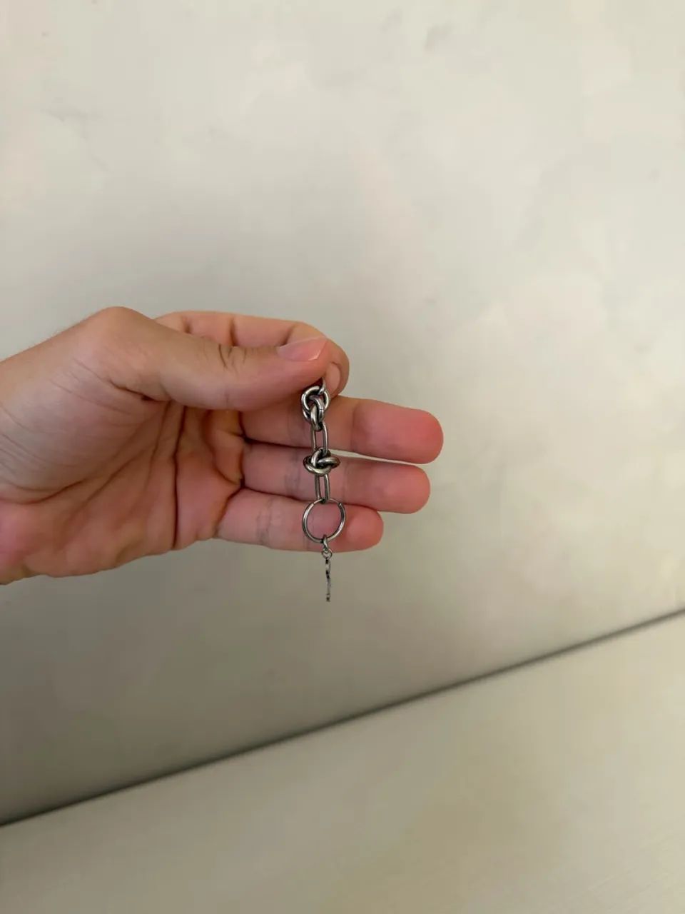 Brinco Raf Simons Silver Double Knot Earring