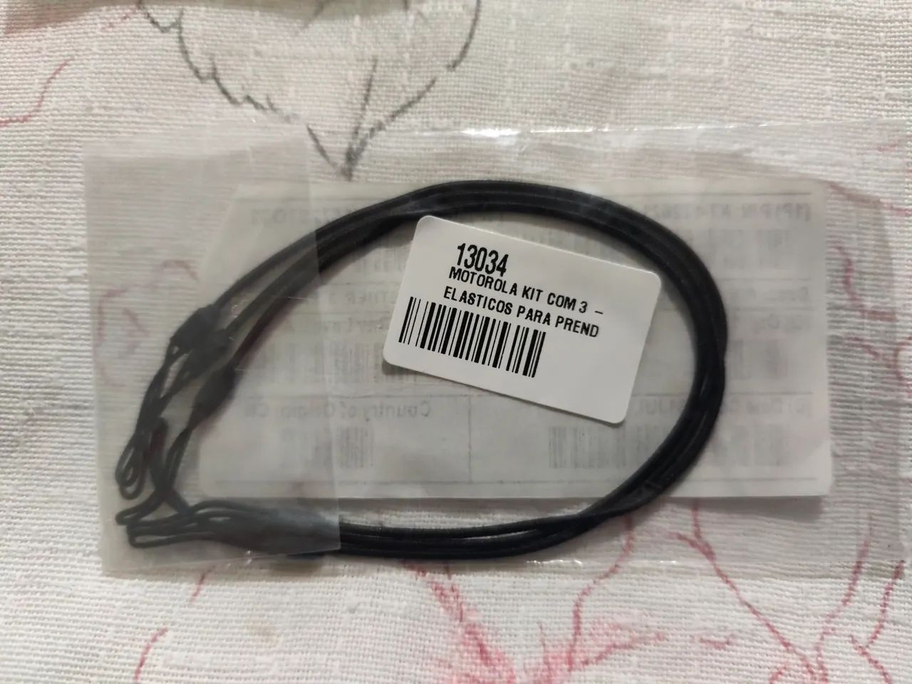 Cordão elástico anti-perda. 