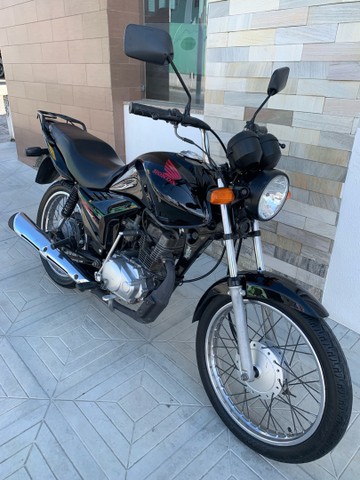 CG FAN 125 EMPLACADA