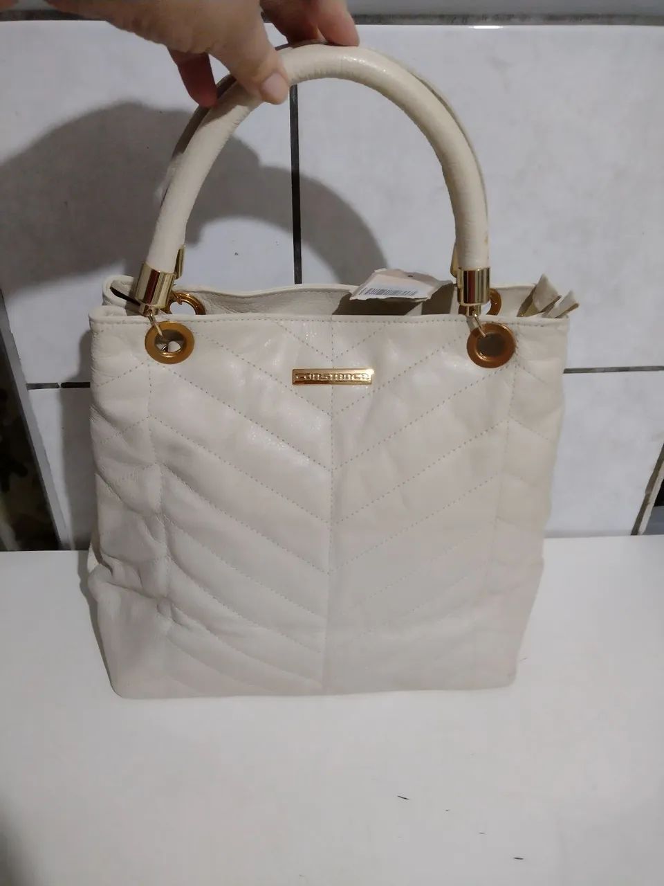 Bolsa Constance em couro 