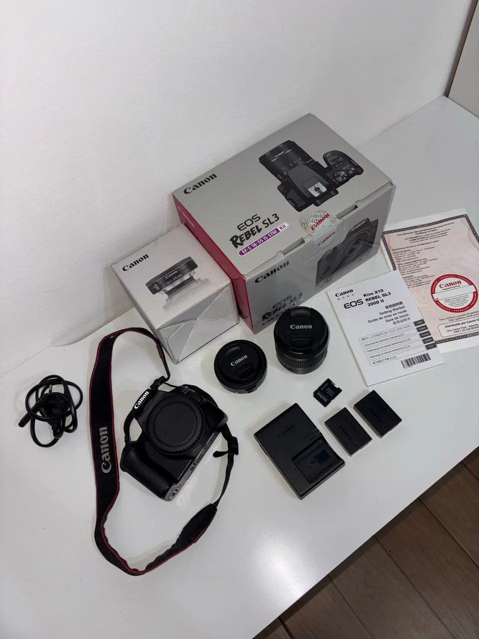 Camera Canon SL3 + lente 24mm f/2.8 + lente do kit 18-55 + acessórios