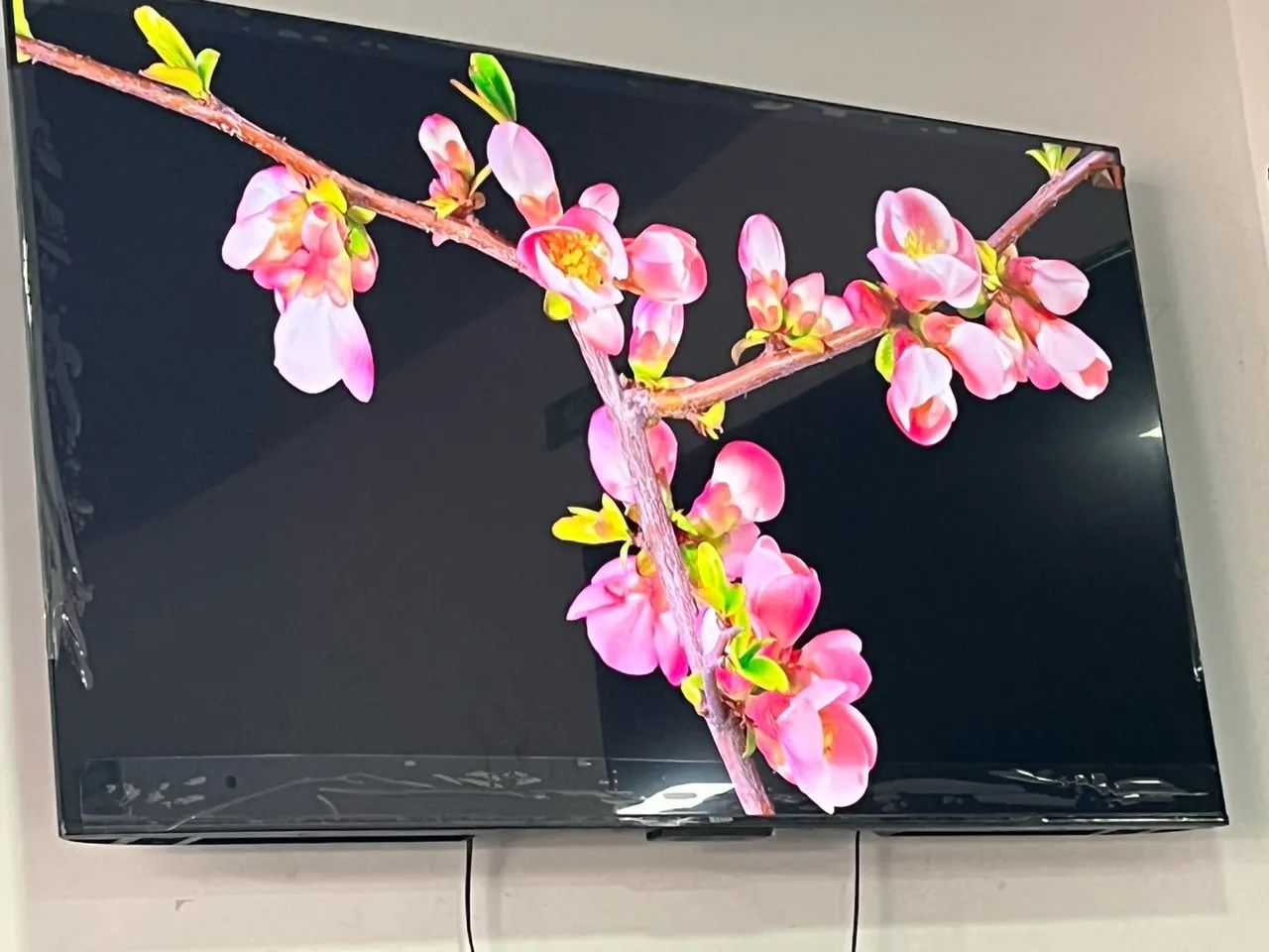 TV QLED  65 polegadas TCL 4k Bhuetooth Alexia nova plástico garantia - Foto 2
