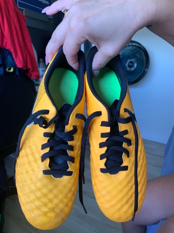 chuteira magista laranja