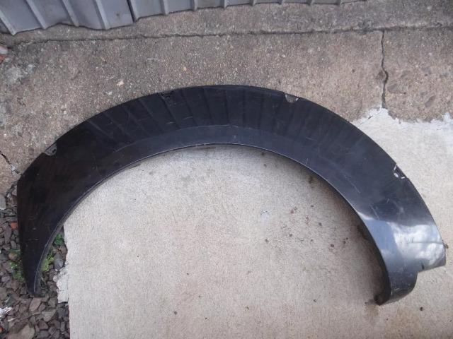 Alargador / Acabamento Paralama Traseiro Esquerdo p/ Nissan Frontier 2003 a 2007 Original