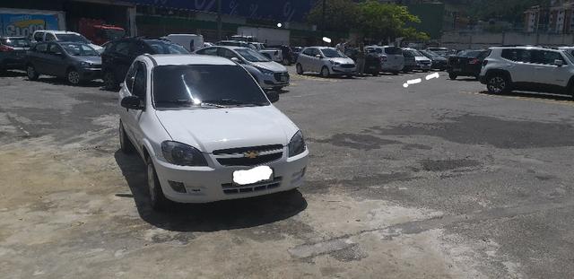 Celta com Ar Condicionado,Vidro Eletrico, Trava Eletrica e Alarme !!! - Foto 6