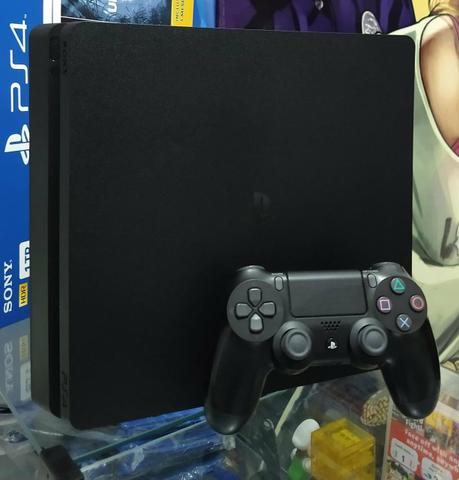 PS4 Slim 500gb ( semi-novo) com 1 jogo + 1 capa para console + Garantia