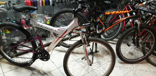 Bicicleta aro 26 com suspensão no quadro e no garfo com 21 velocidades - Foto 5