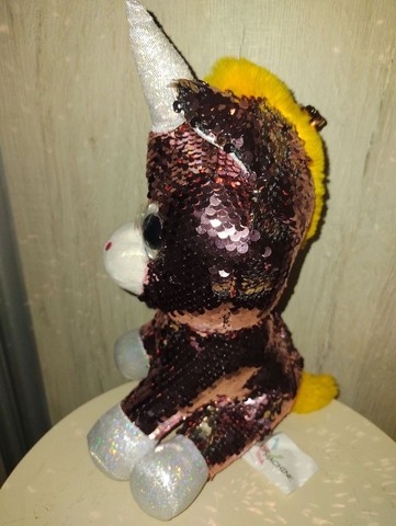 bicho de pelúcia zoiudinho unicórnio com paetê muda de cor 30cm.