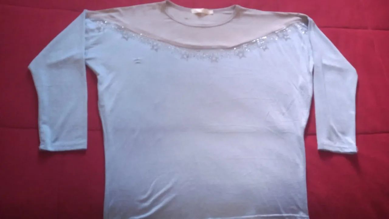 Blusa feminina. Tamanho GG