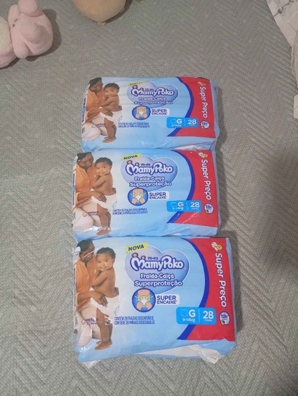 Fralda mamypoko tamanho G