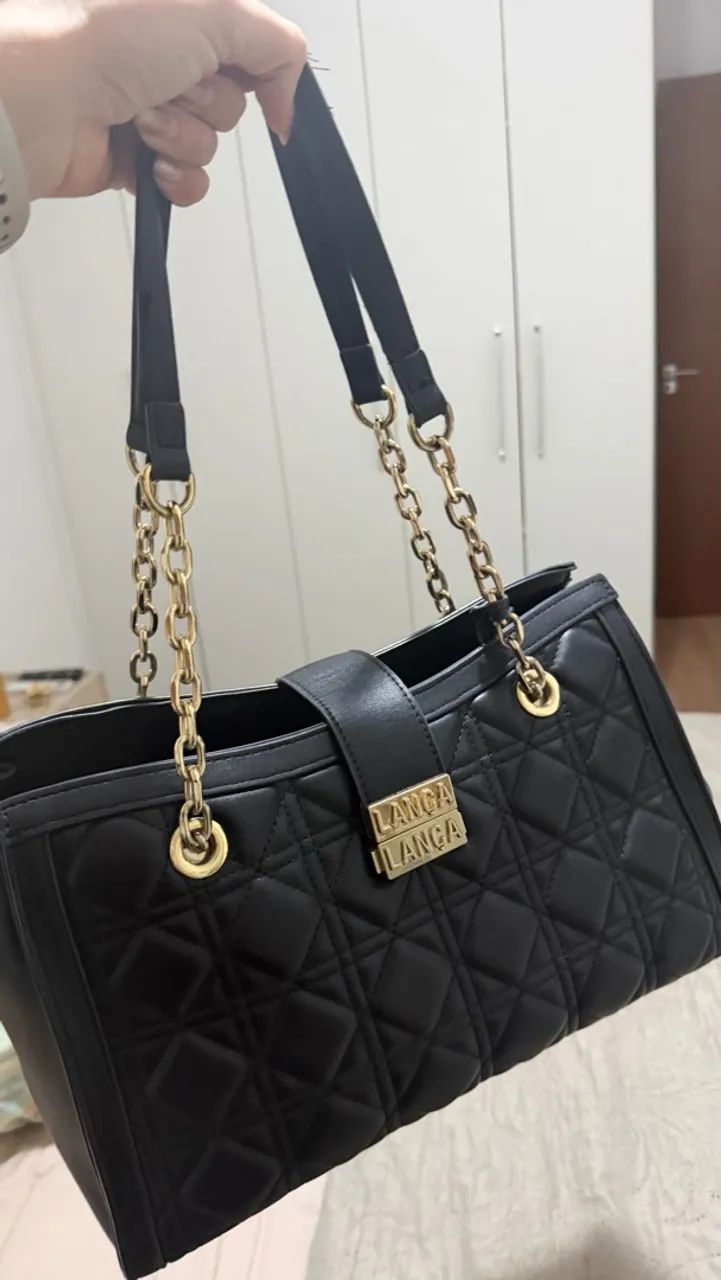 Bolsa lança perfume 