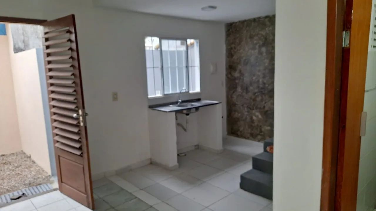 Casa com 2/4, sendo 1 suíte, garagem, portão eletrônico e cerca elétrica.  - Foto 4