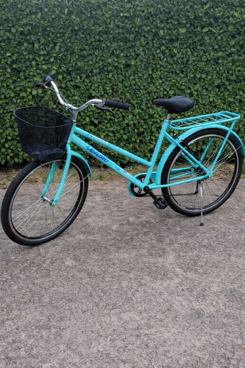 Bicicleta azul tiffany com nota