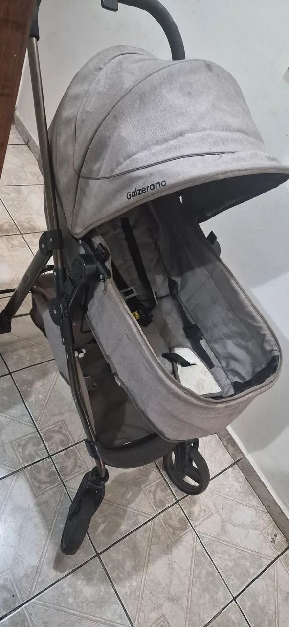 Carrinho e bebe conforto Galzerano.