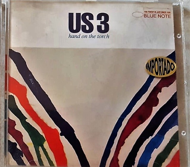 US 3 - Importado - Hand on the torch