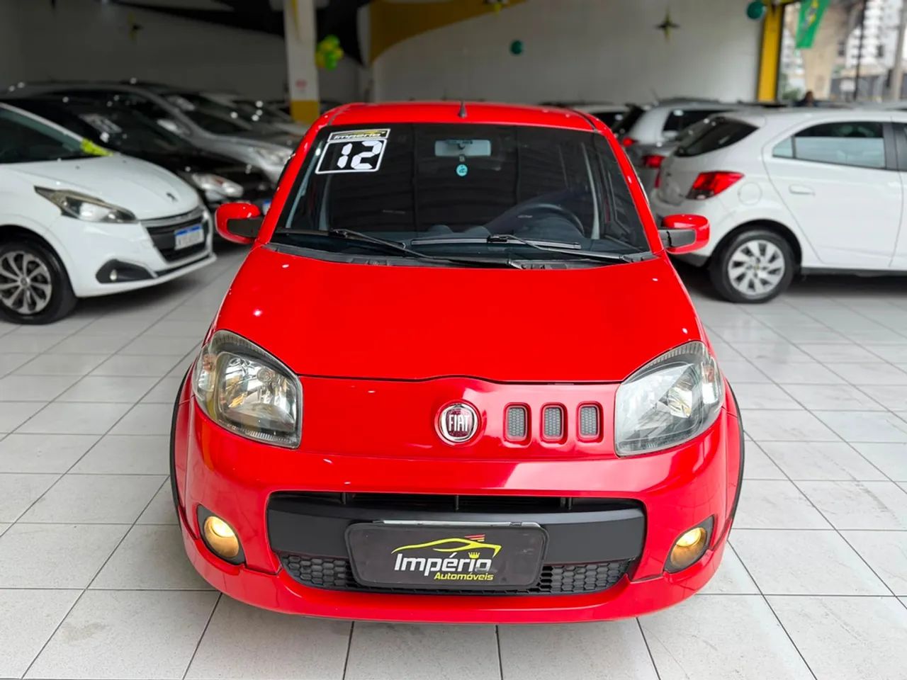 Fiat Uno Sporting 1.4 EVO Fire Flex 8V 4P 2012 - Foto 2