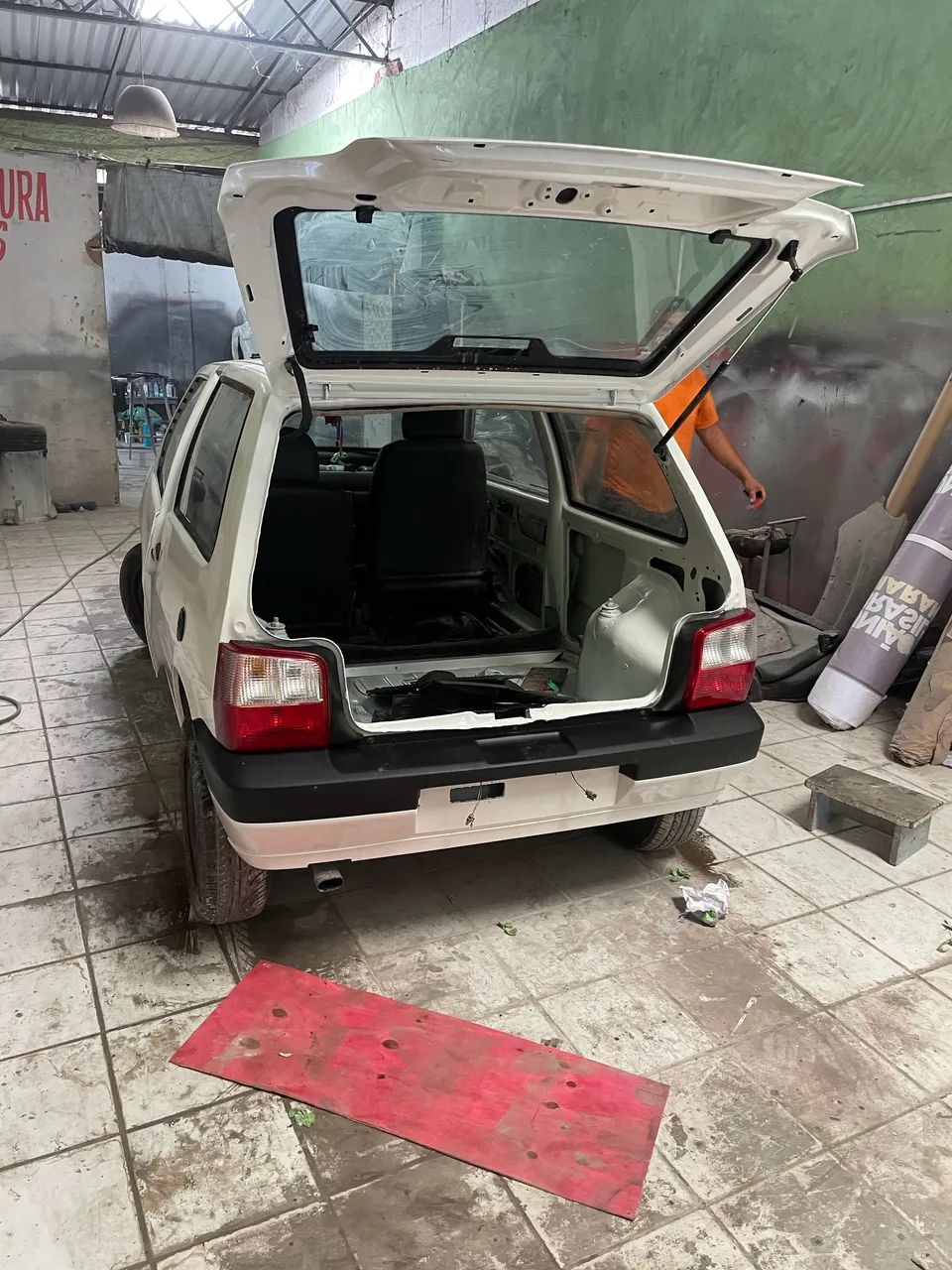 Trabalho com funilaria e pintura 