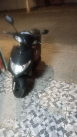 BURGMAN 125 TROCO POR TITAN