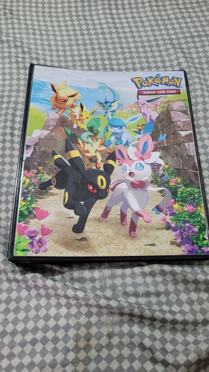 Album pokemon eves + 13 folhas + 180 cards