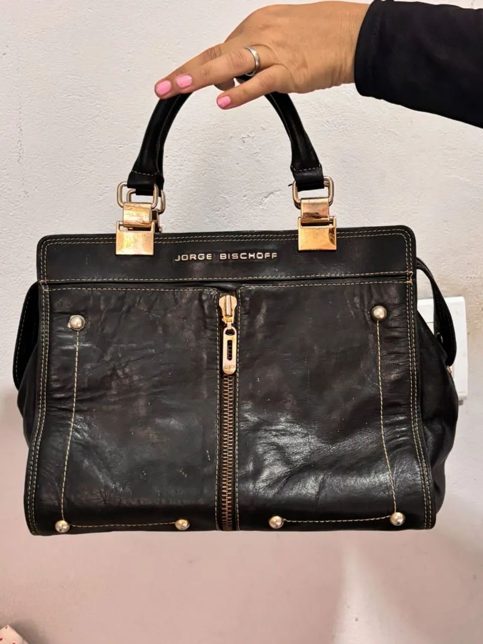 Bolsa em couro e original 