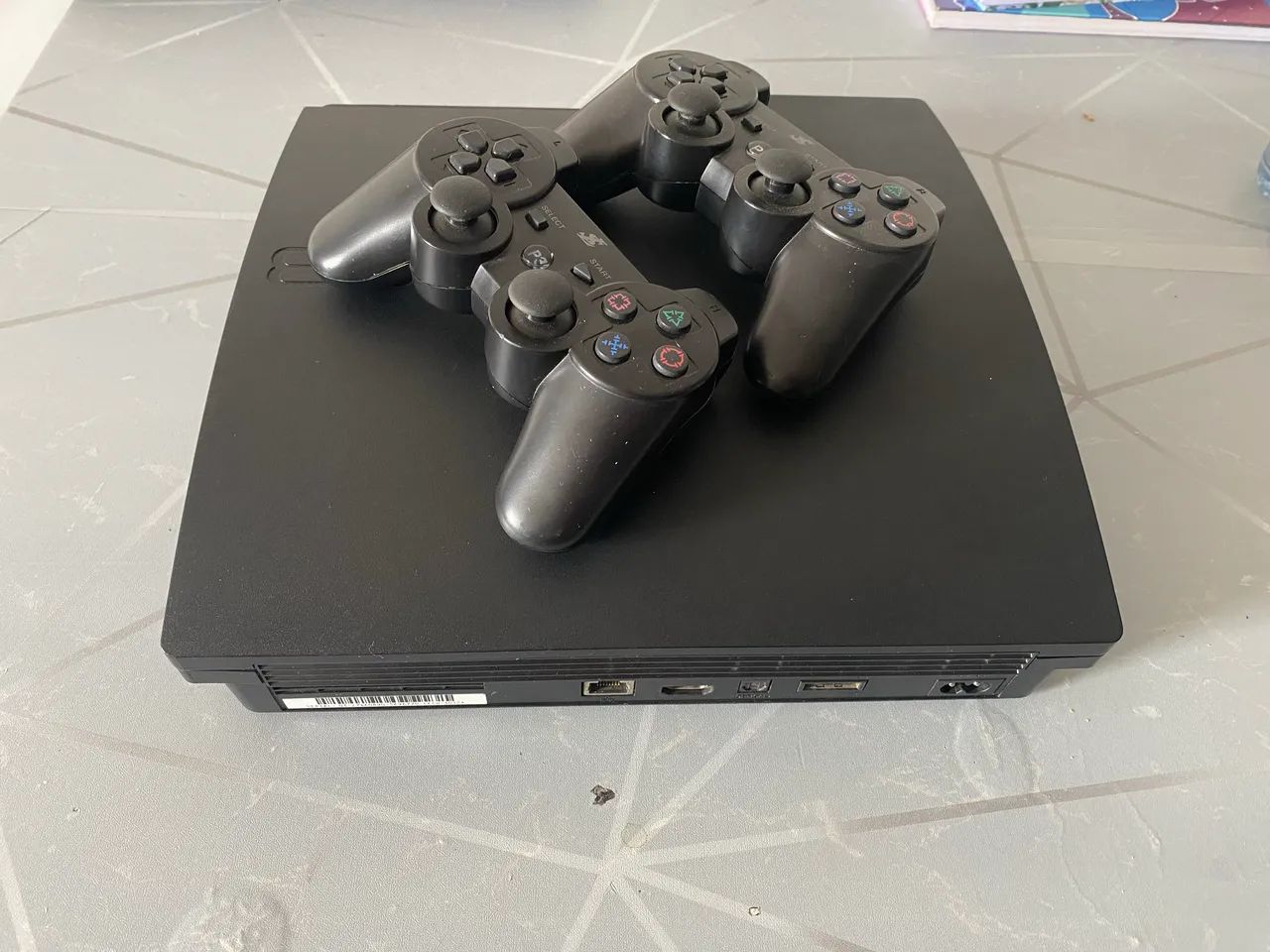 Ps3 slim mais dois controles  - Foto 2