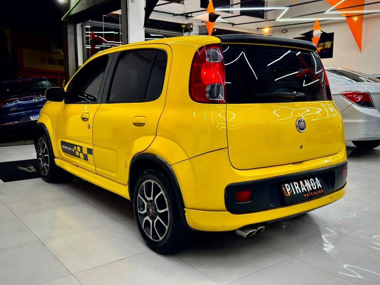 Fiat Uno Sporting 1.4 EVO Fire Flex 8V 4P 2012 - Foto 5