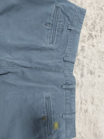 calça social lacoste