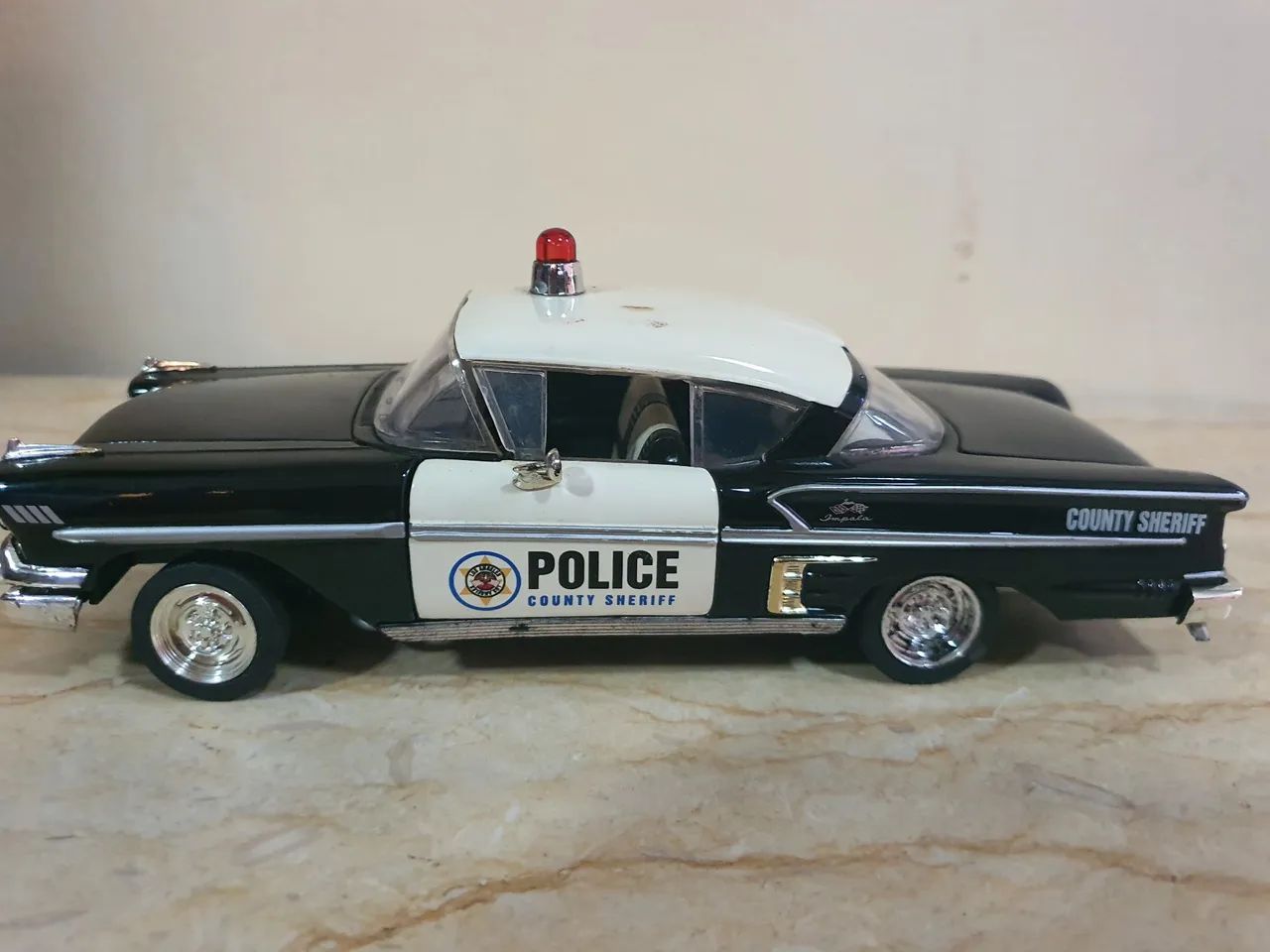 VEÍCULO POLICIAL IMPALA CHEVY 1958