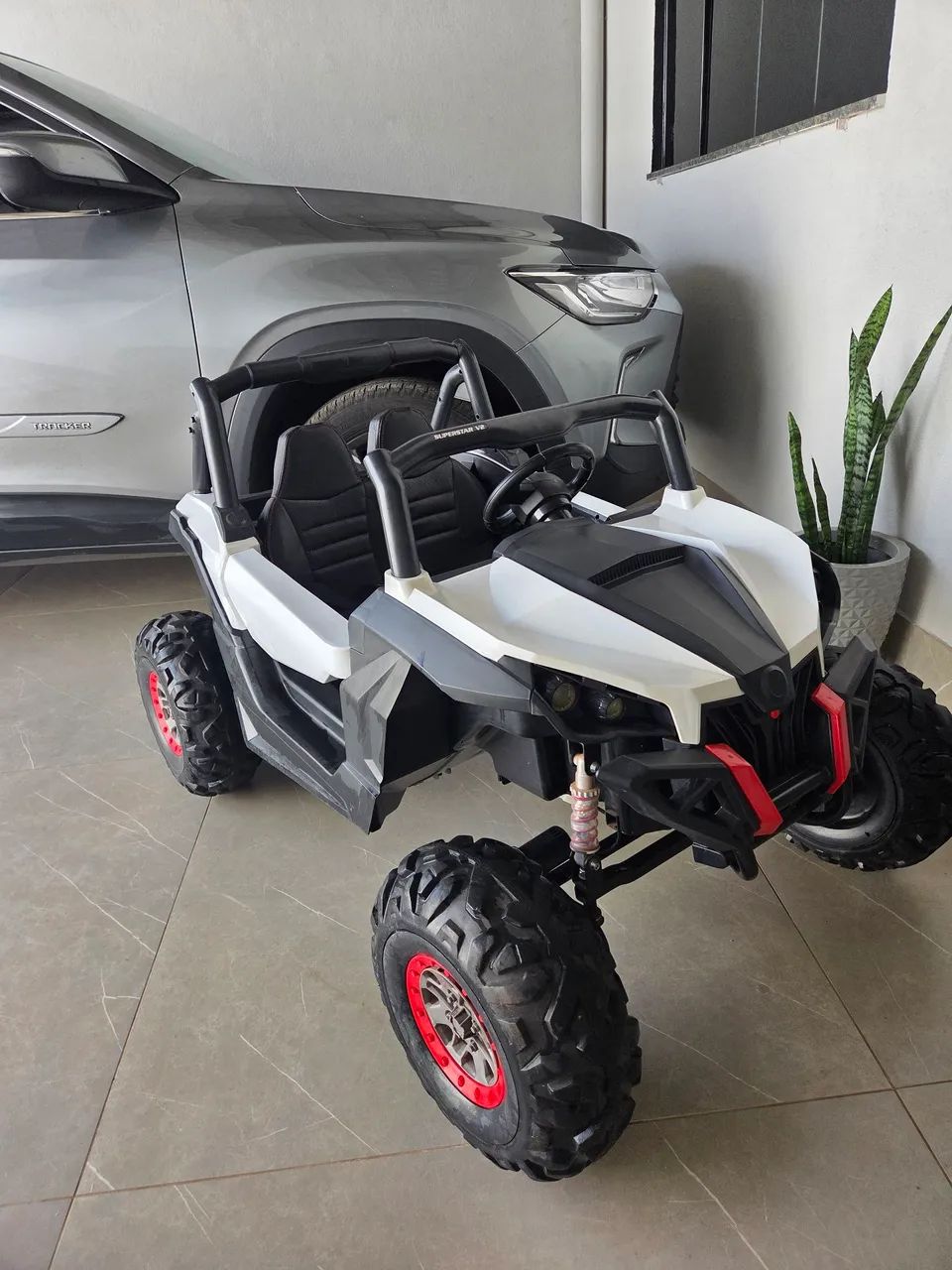 Carrinho elétrico infantil buggt 4x4 UTV 12v