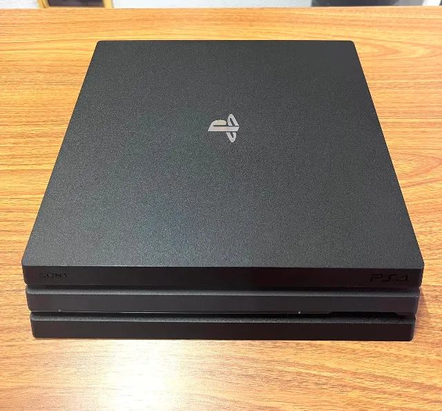 PS4 PRO + 2 JOGOS - Foto 2