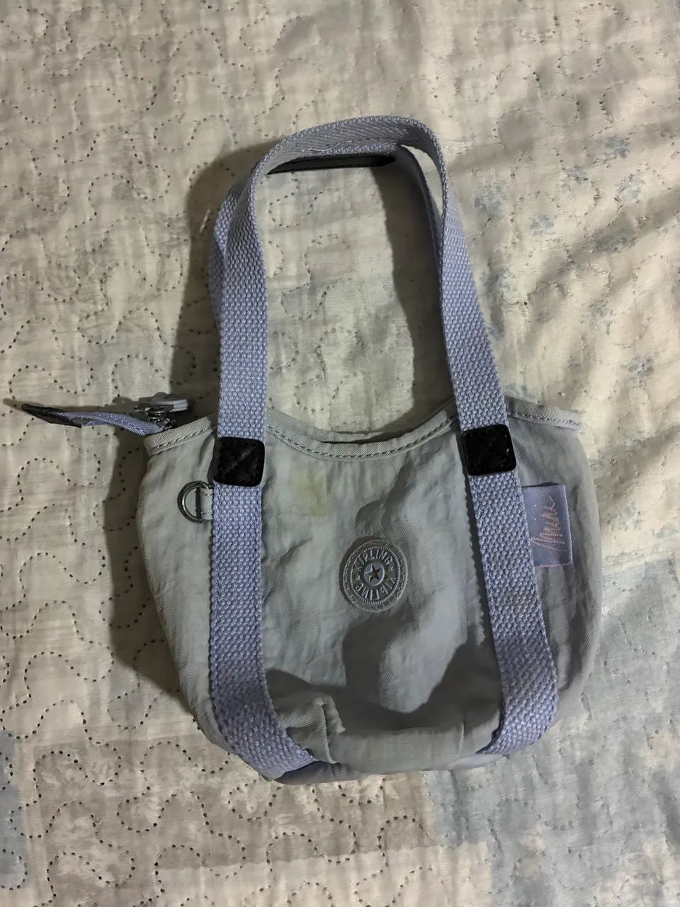 Vendo mini bolsa Kipling lilás 