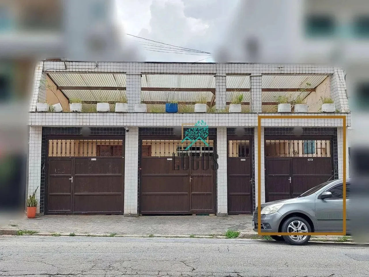 Casa térrea com 3 dormitórios para alugar, 100 m² por R$ 5.150/mês - Vila Floresta - Santo