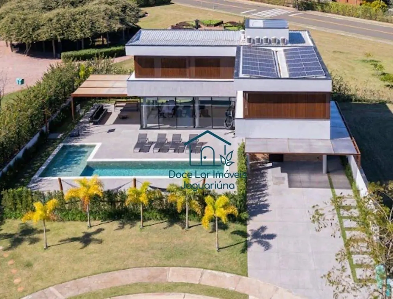 Casa com 3 dormitórios à venda, 350 m² por R$ 3.930.000,00 - Condomínio Tamboré Jaguariúna
