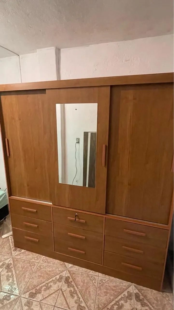 Guarda roupa casal 9 gavetas 