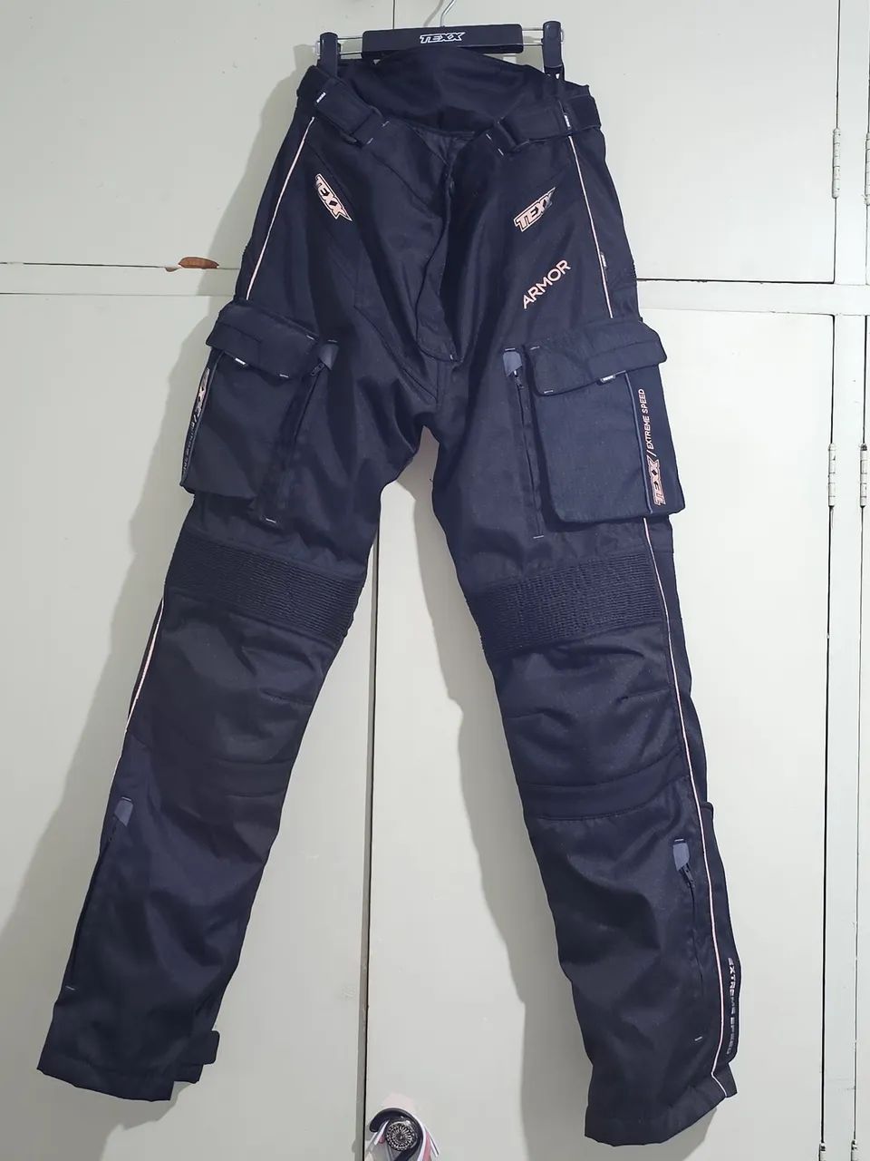 Calça Texx Armor para motociclista com proteção e impermeável 