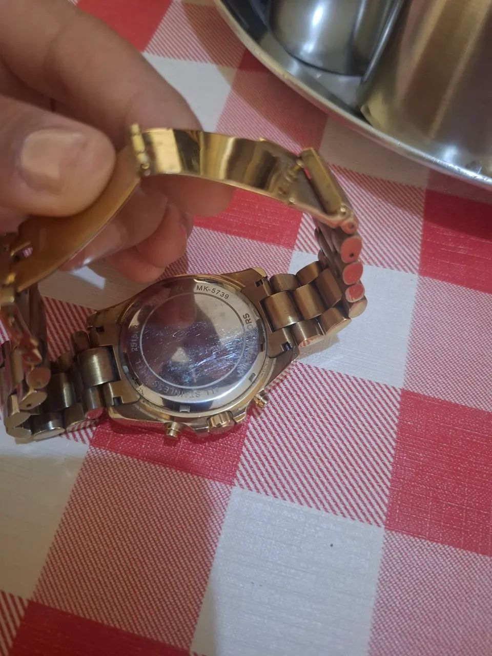 Relógio Michael Kors Dourado original usado - Foto 4
