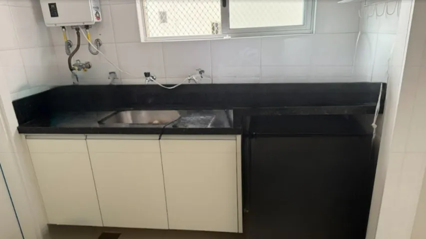 Bancada em granito com tanque inox e armário em mdf