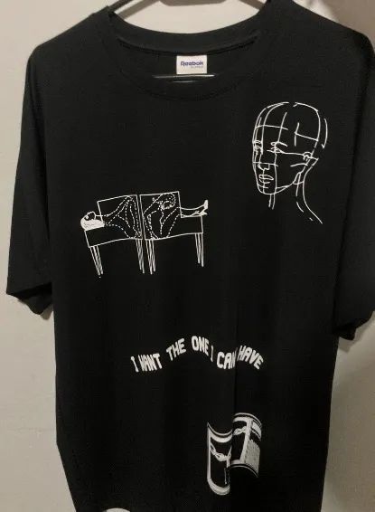 camiseta pleasures x reebok preta oversized