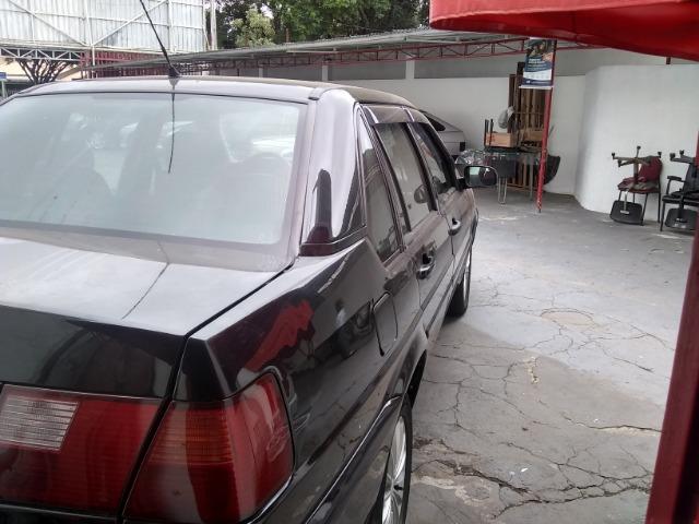 Volkswagen santana confortline, 4 portas, cor preto, completo, alcool e gnv - Foto 5