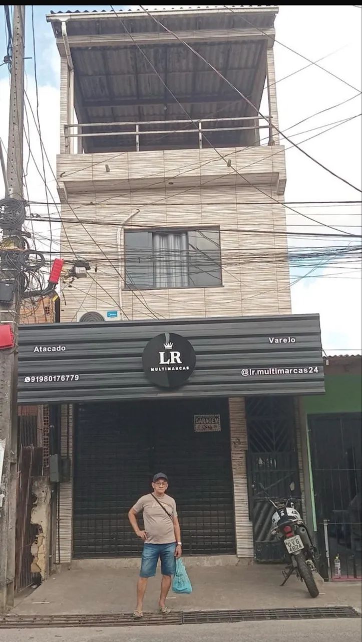 Vendo casa de 3 pavimentos com ponto comercial 