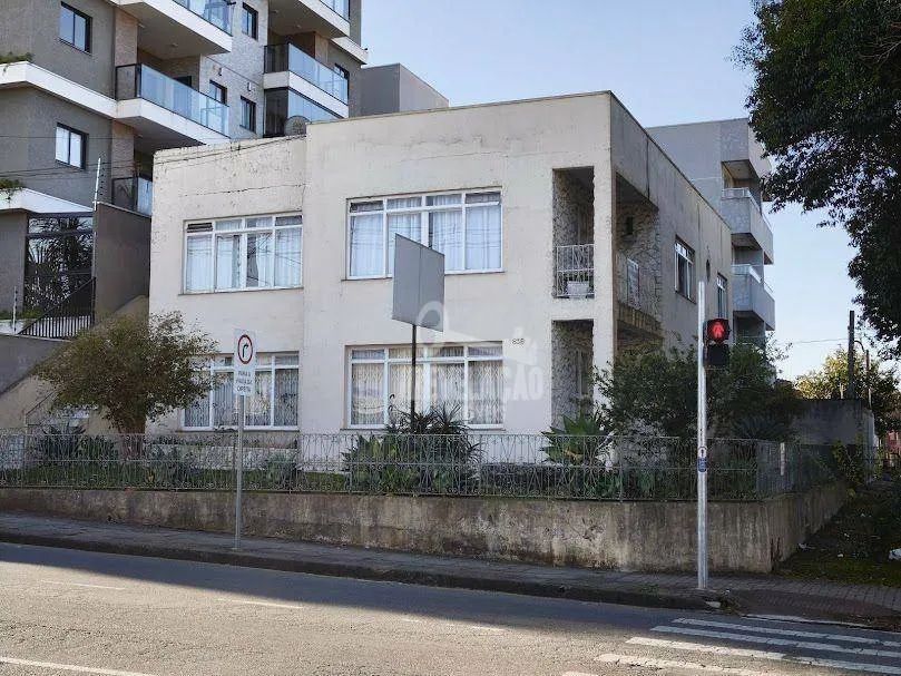 Casa comercial de esquina, terreno 405 m², Centro
