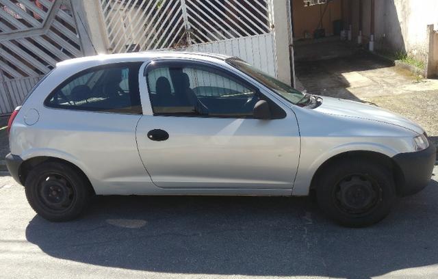 Celta 2001 GNV Alarme,trava e som