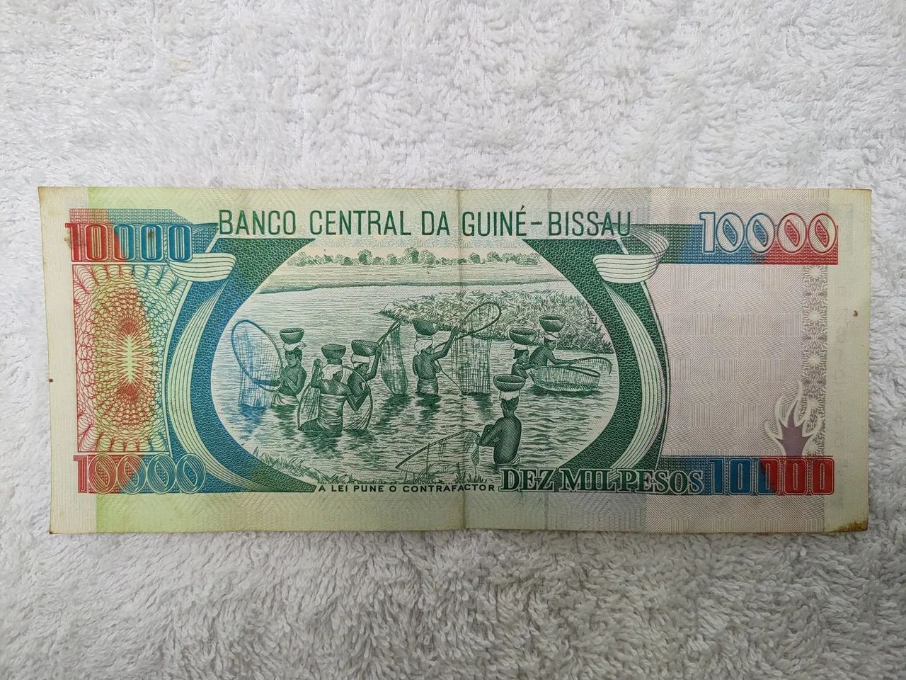 Nota de 10.000 Pesos da Guiné-Bissau - Foto 5