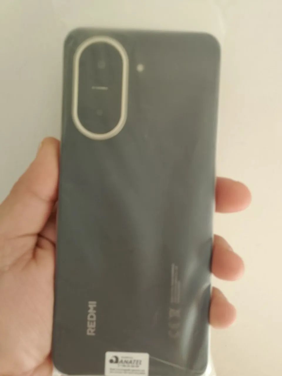 Celular Redimi A05, 128 gigas, na caixa 