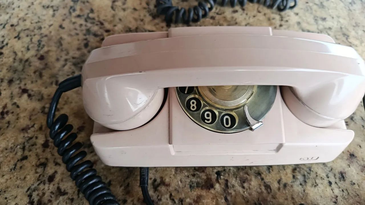 Telefone antigo rosa bebê