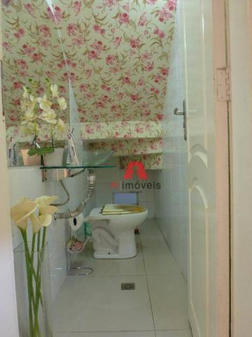 Belíssima casa em fino acabamento, com 03 dormitórios em condomínio fechado. - Foto 9