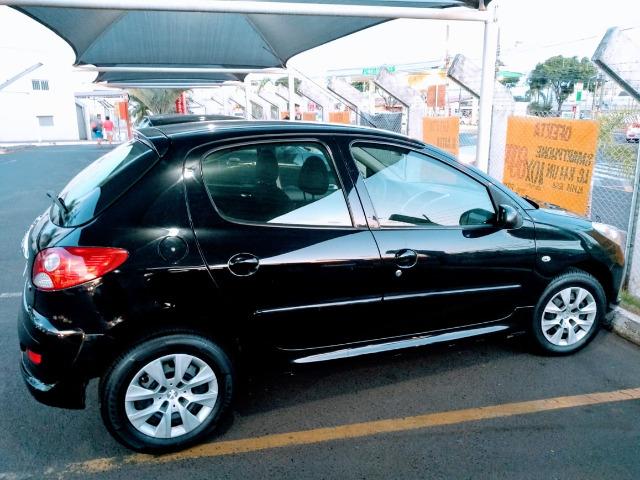 Ágio! Parcela de R$ 332,00! Peugeot 207 2012 1.4 completo 75.000 km rodados - Foto 5