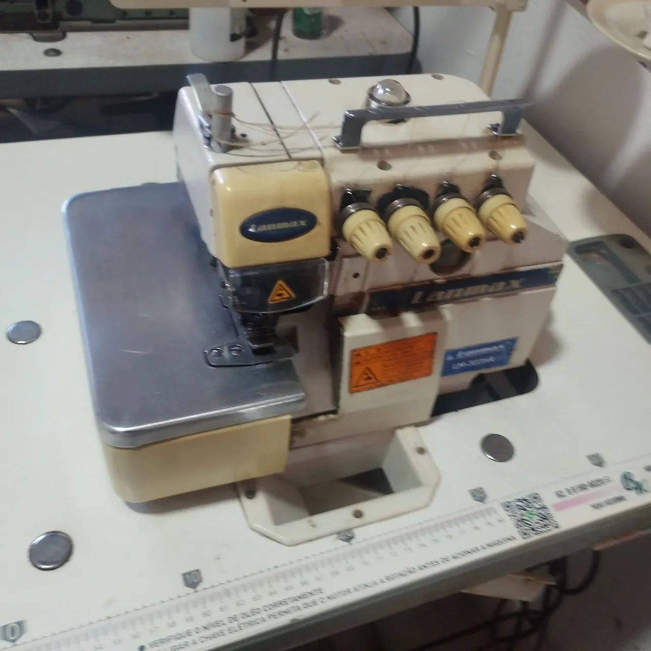 Máquina overlock ponto cadeia