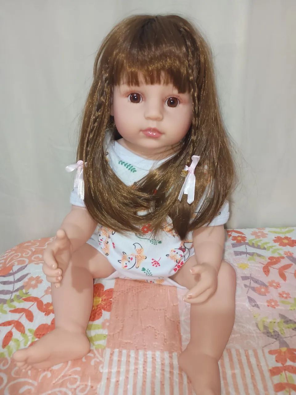 Boneca Reborn menina de trancinhas  - Foto 5