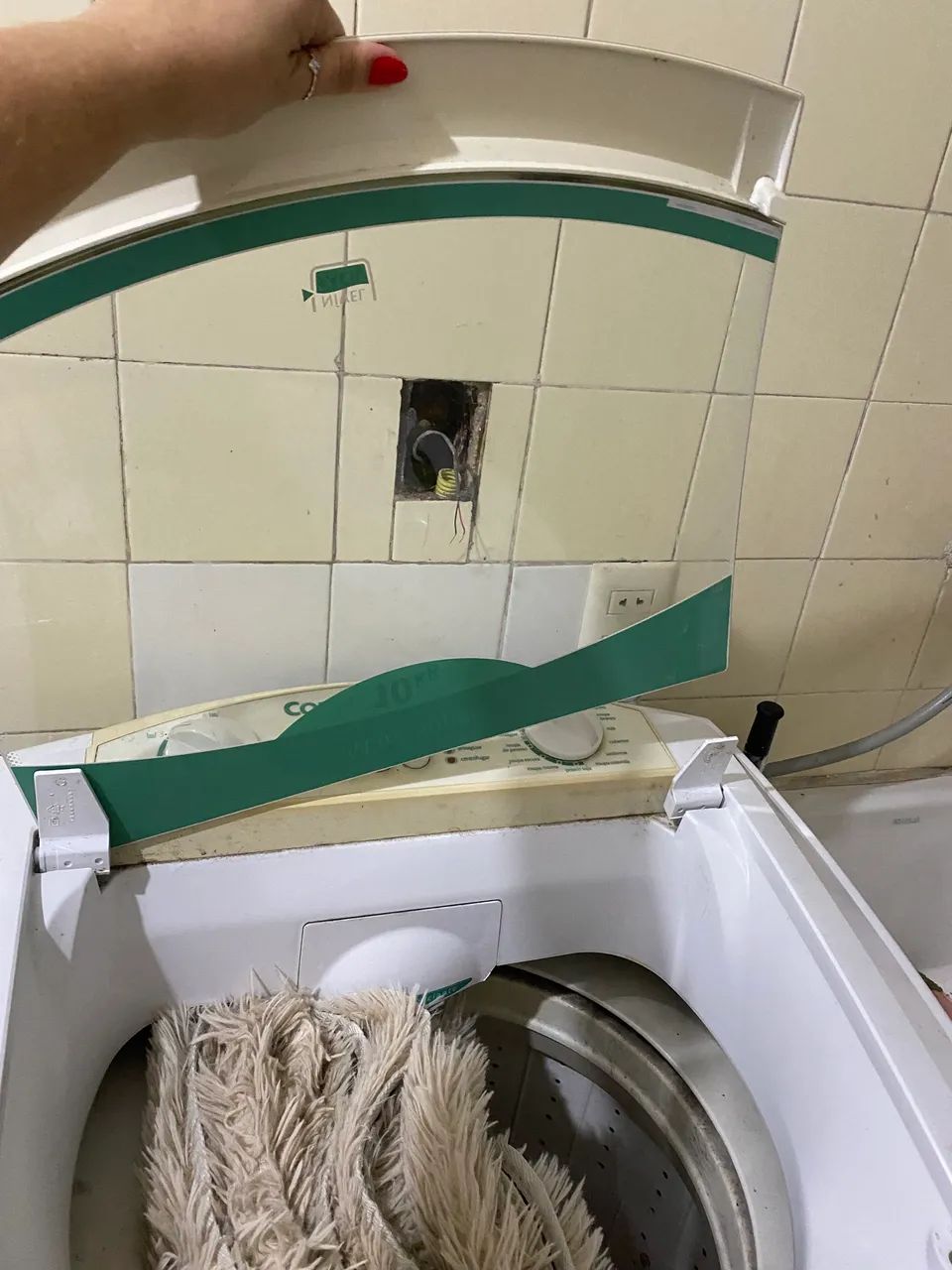 Máquina de lavar com defeito